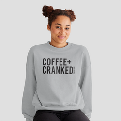 woman wearing coffee + cranked crew sweatshirt